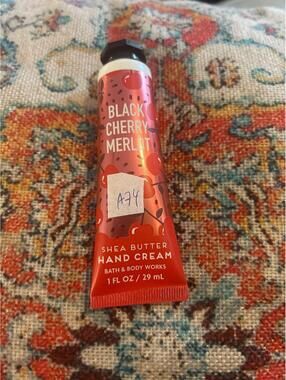 A74 1 Bath and Body Works hand cream 1 oz shea butter black cherry Merlot